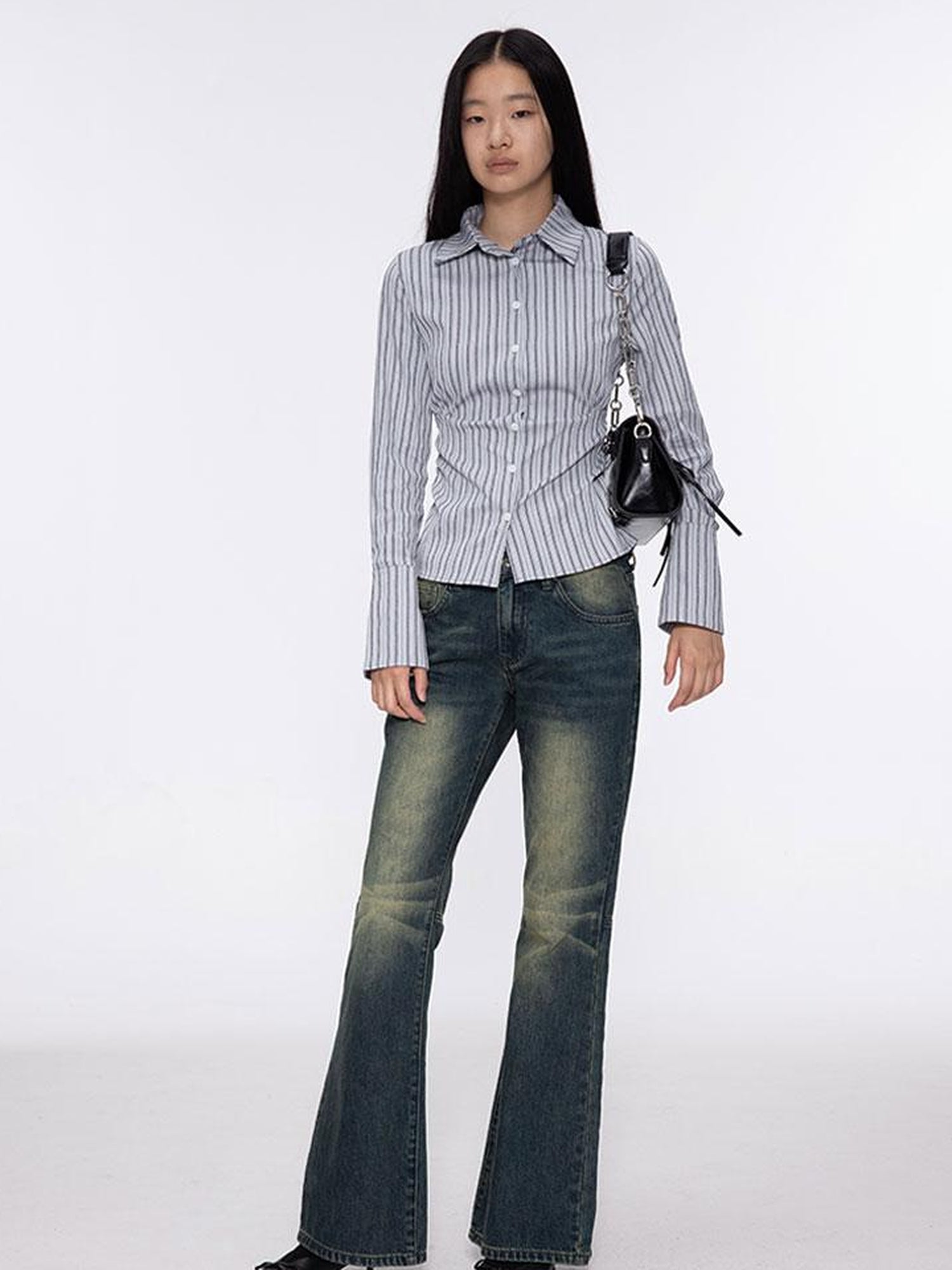 oinimi Low Rise Flared Jeans With Stacked Hem