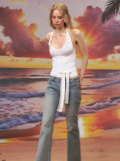 The NeverMore Durable Distressed Relaxed Low Rise Light Blue Denim Women Straight Leg Jeans