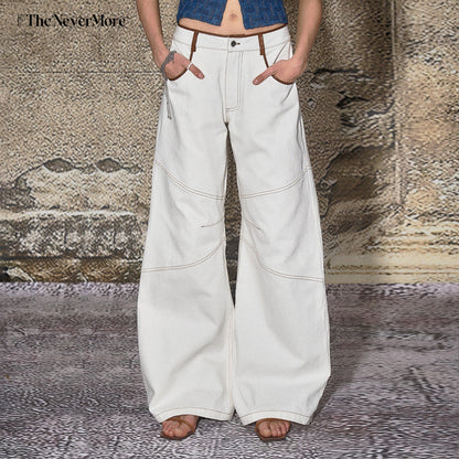 The NeverMore High Cotton Relaxed Distressed Low Rise White Denim Women Wide Leg Jeans
