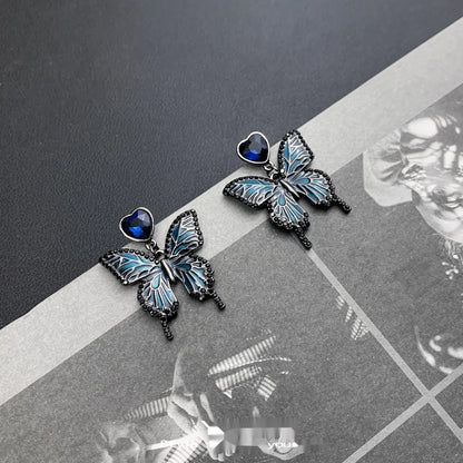 Accessories_Gothic_Blue_Butterfly_Heart_Earrings_MISSTT