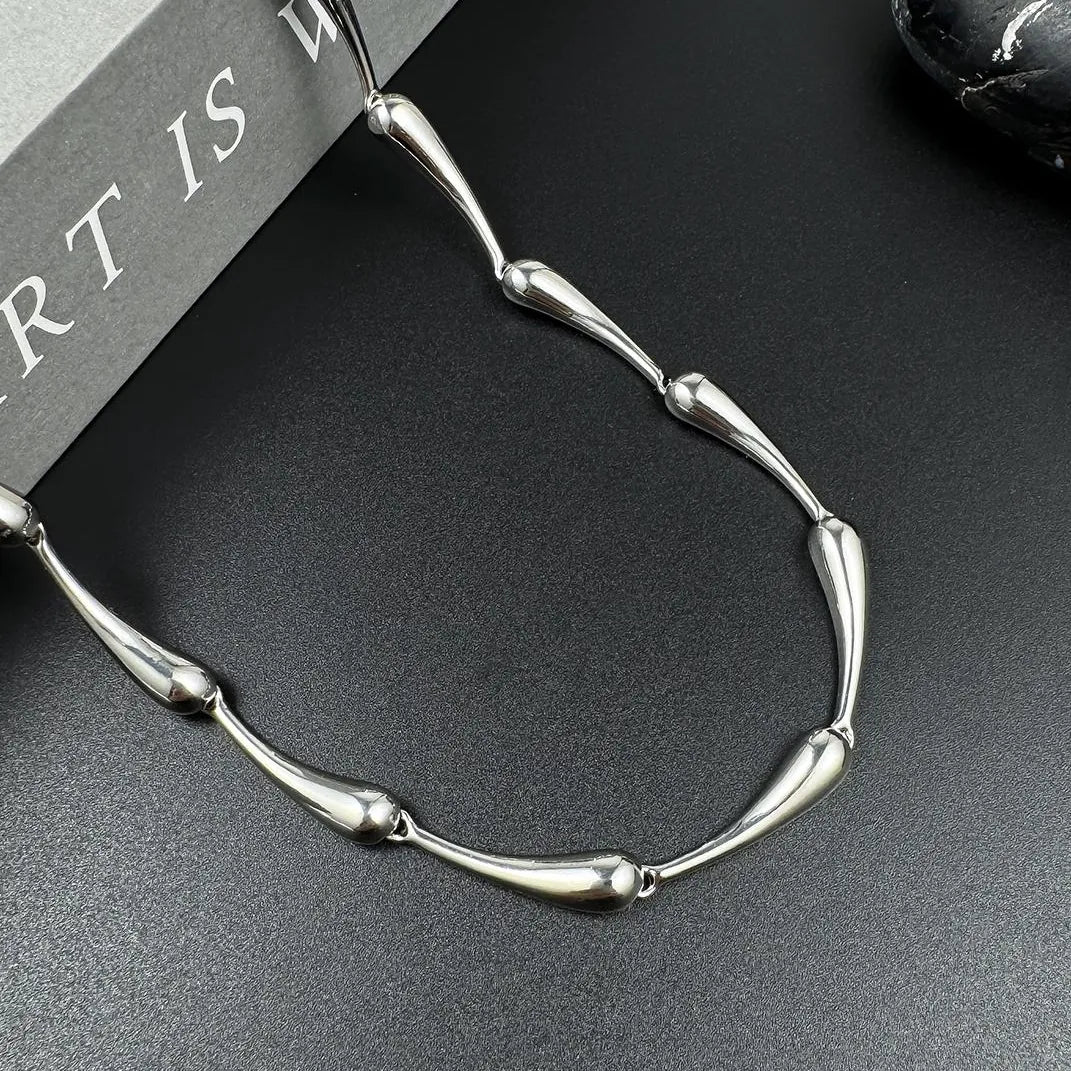 Accessories Sleek Metallic Silver Teardrop Bamboo Necklace