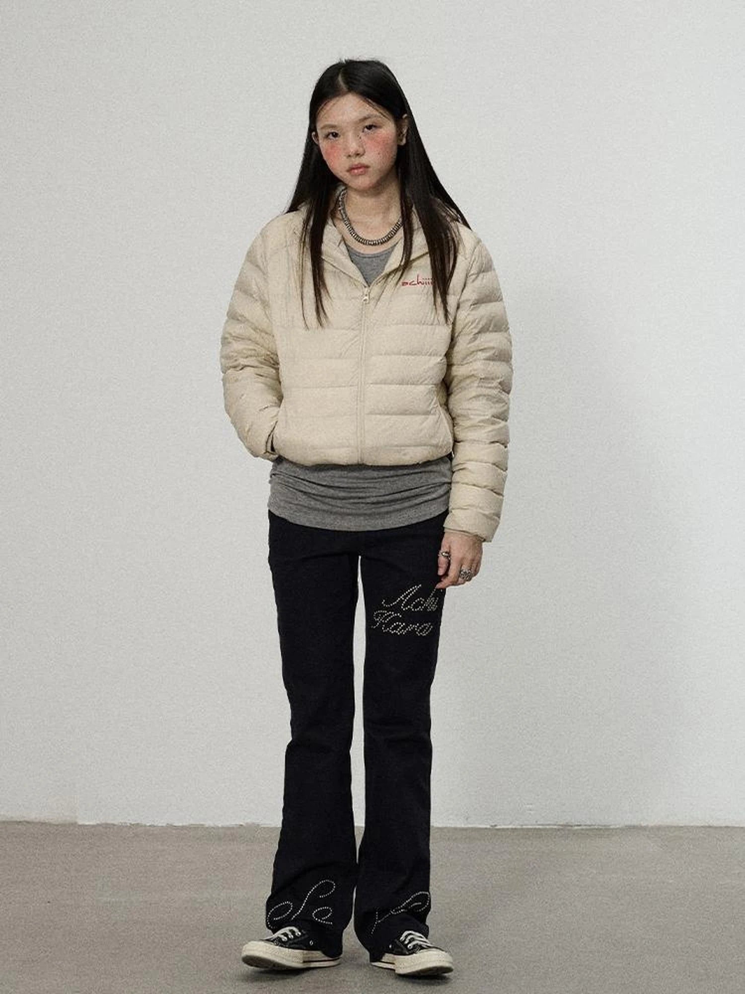 Distressed Denim With Rhinestone Flares