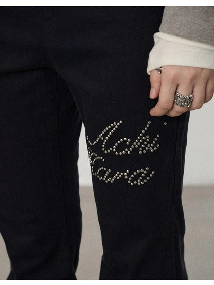 Distressed Denim With Rhinestone Flares