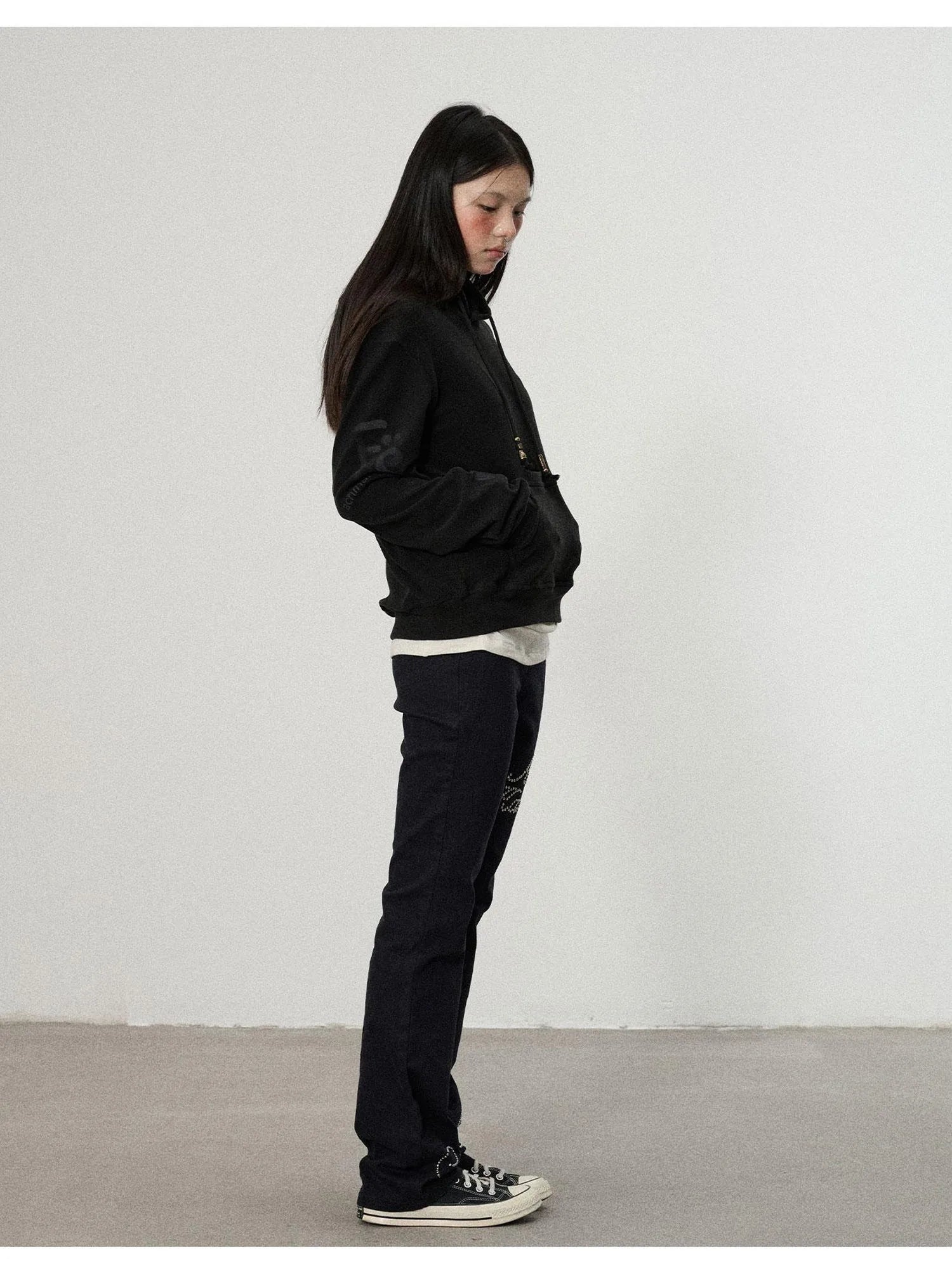 Distressed Denim With Rhinestone Flares