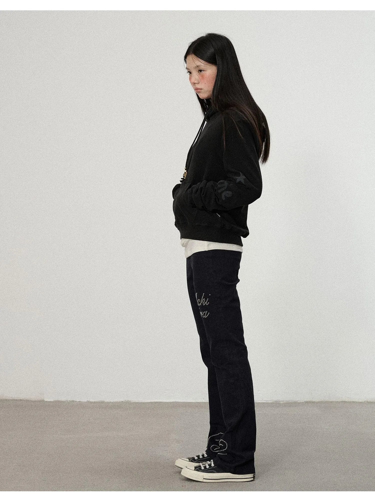 Distressed Denim With Rhinestone Flares