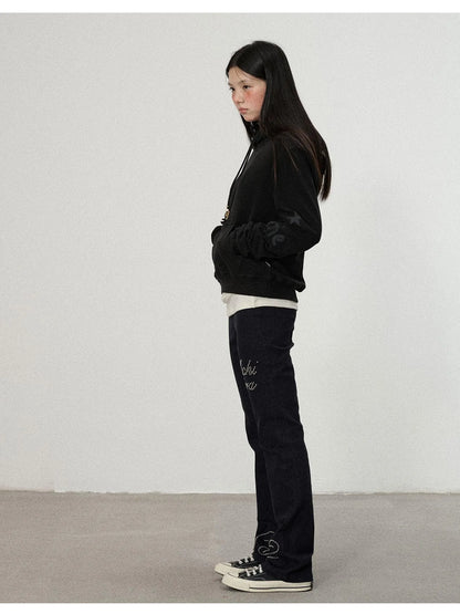 Distressed Denim With Rhinestone Flares