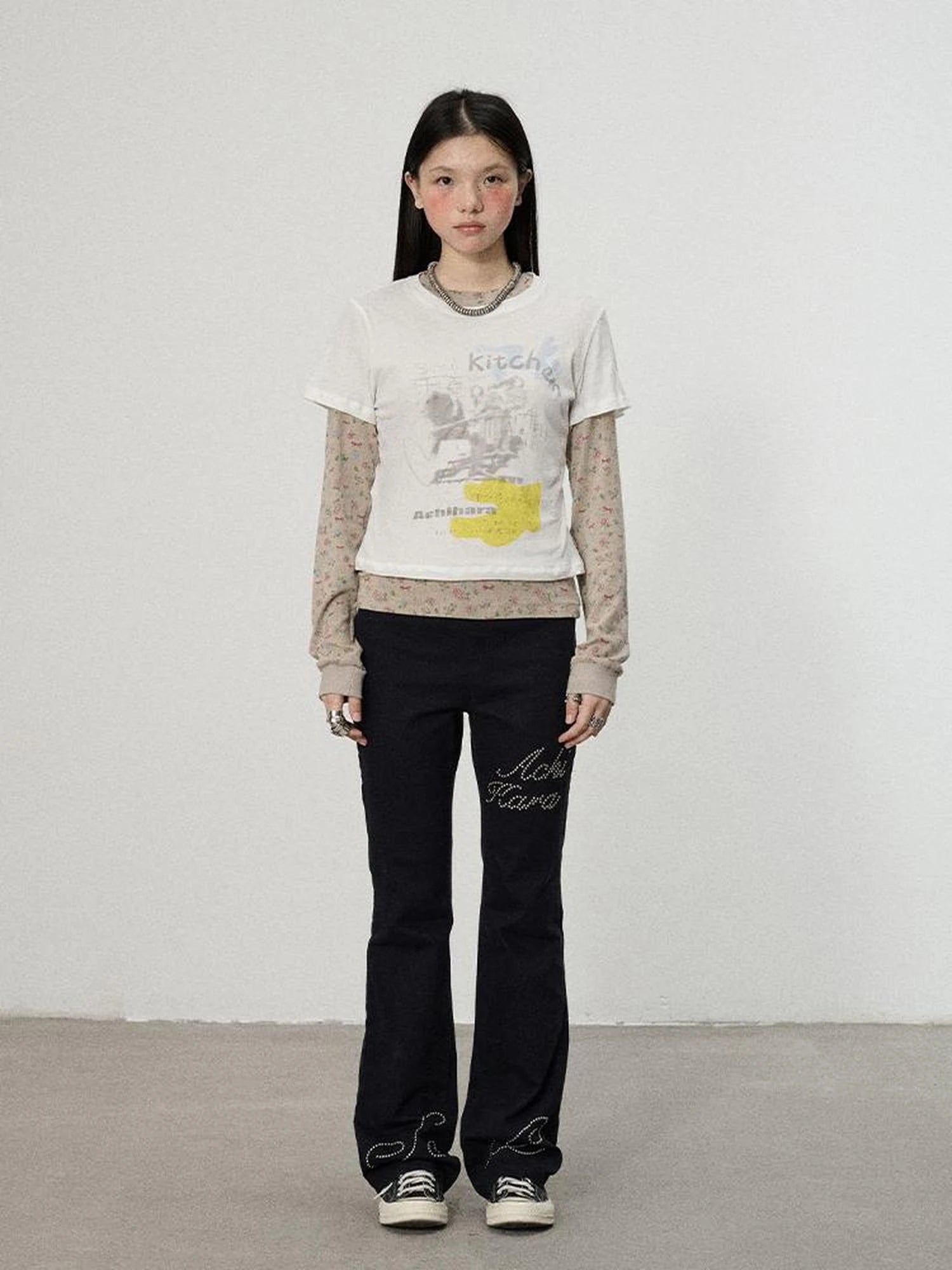 Distressed Denim With Rhinestone Flares