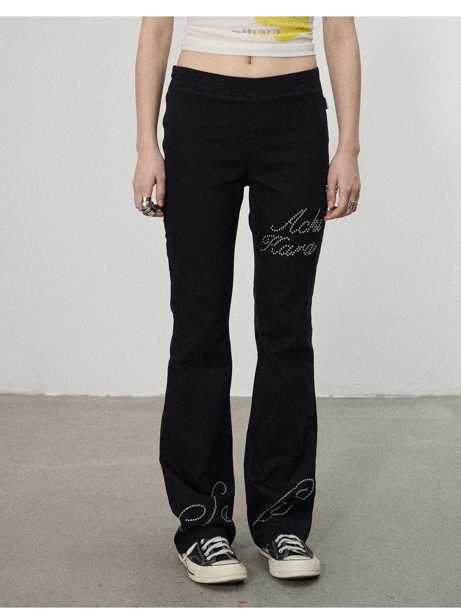 Distressed Denim With Rhinestone Flares