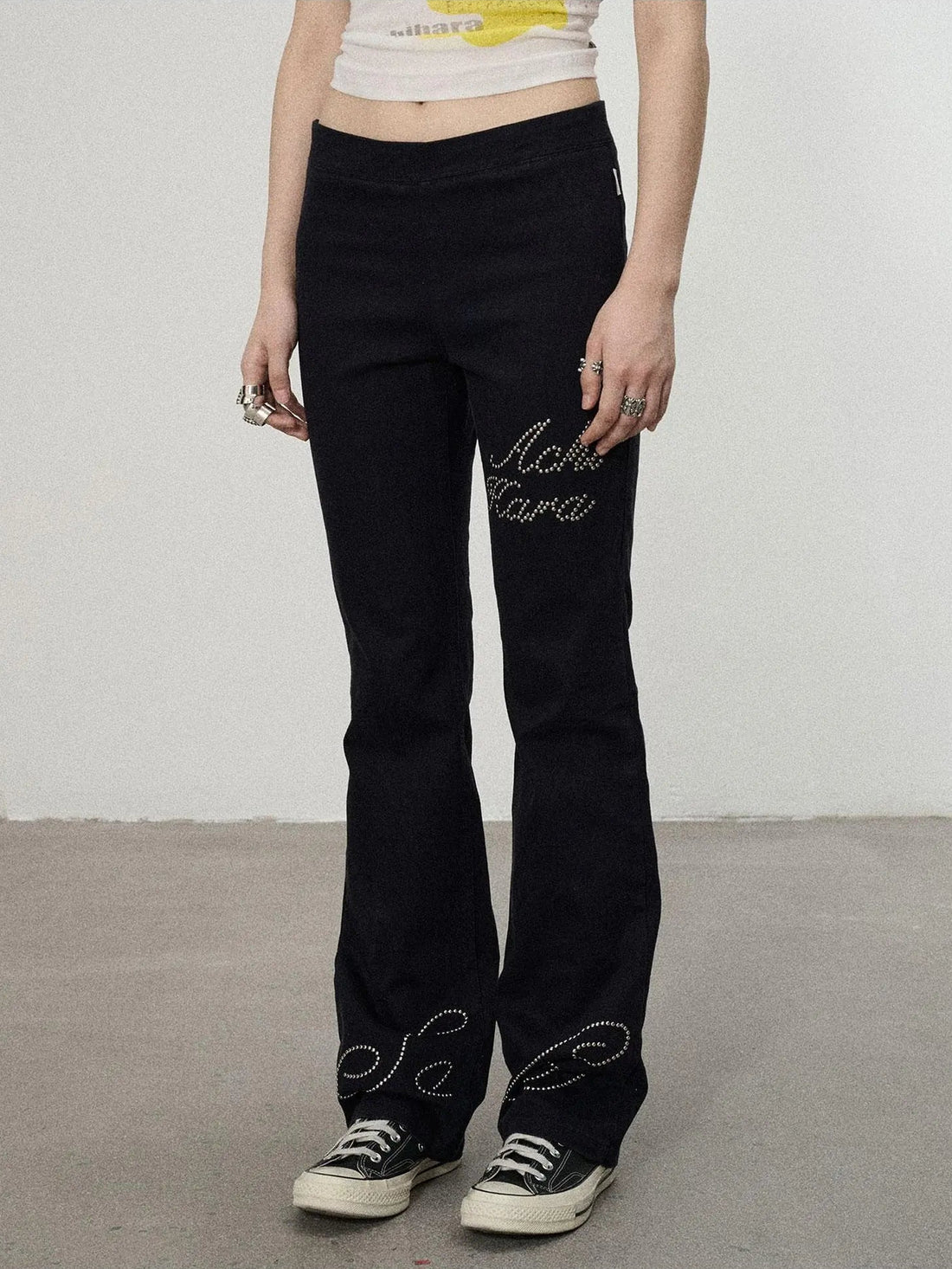 Distressed Denim With Rhinestone Flares