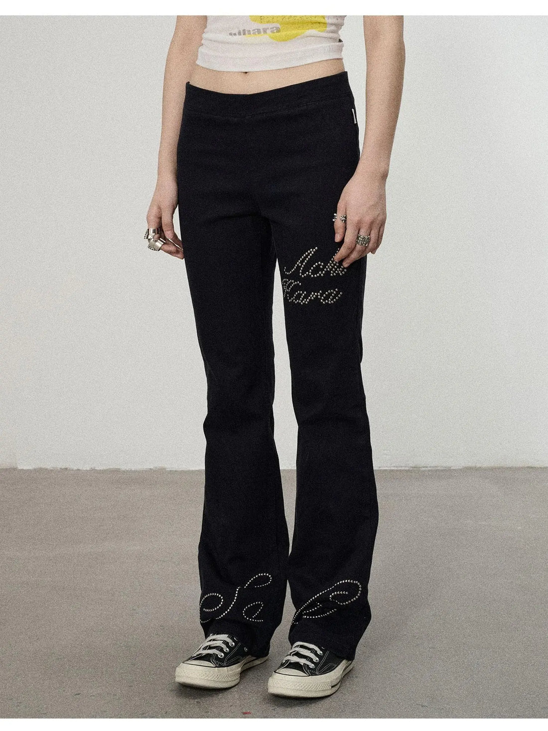 Distressed Denim With Rhinestone Flares