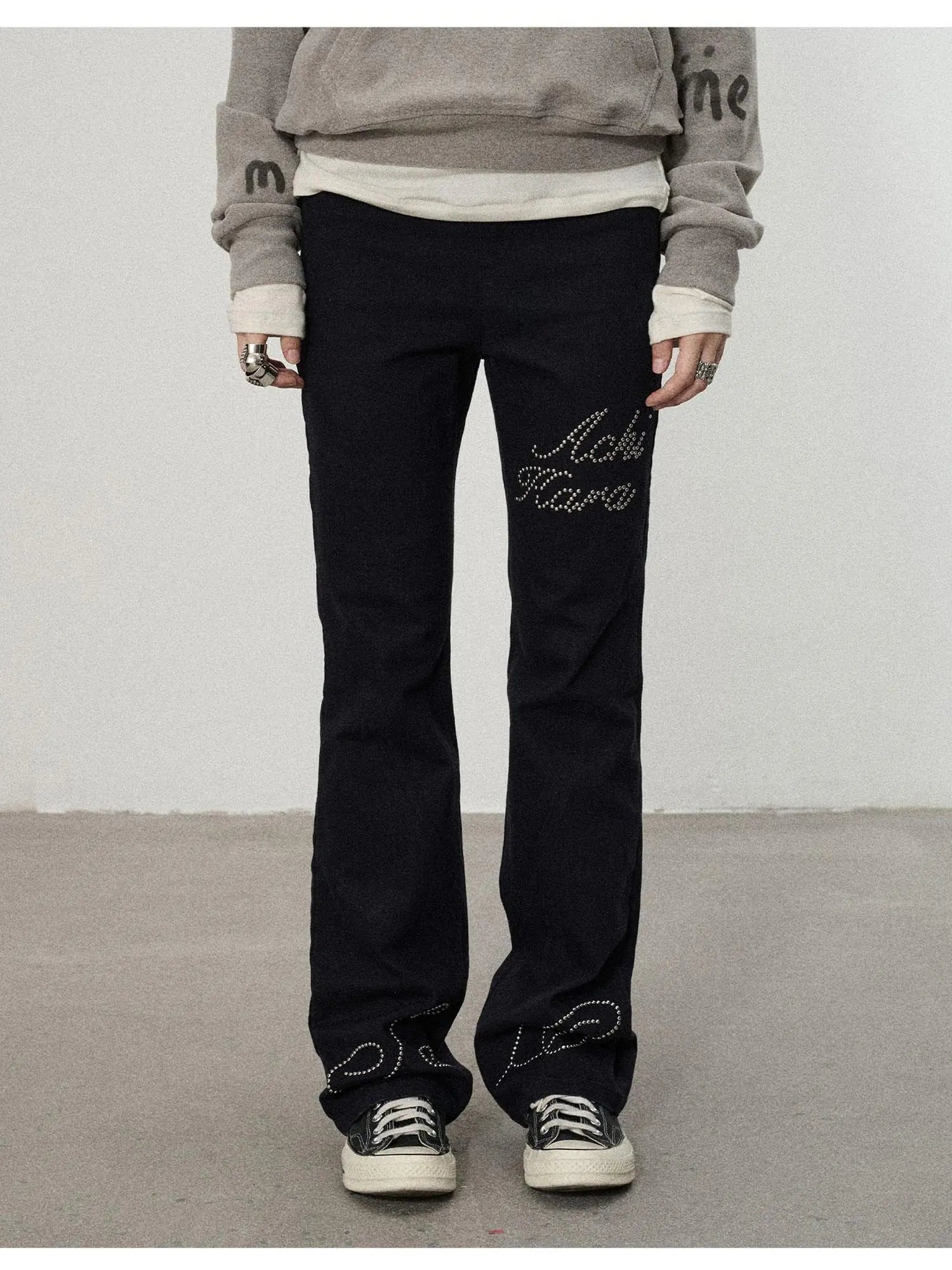Distressed Denim With Rhinestone Flares