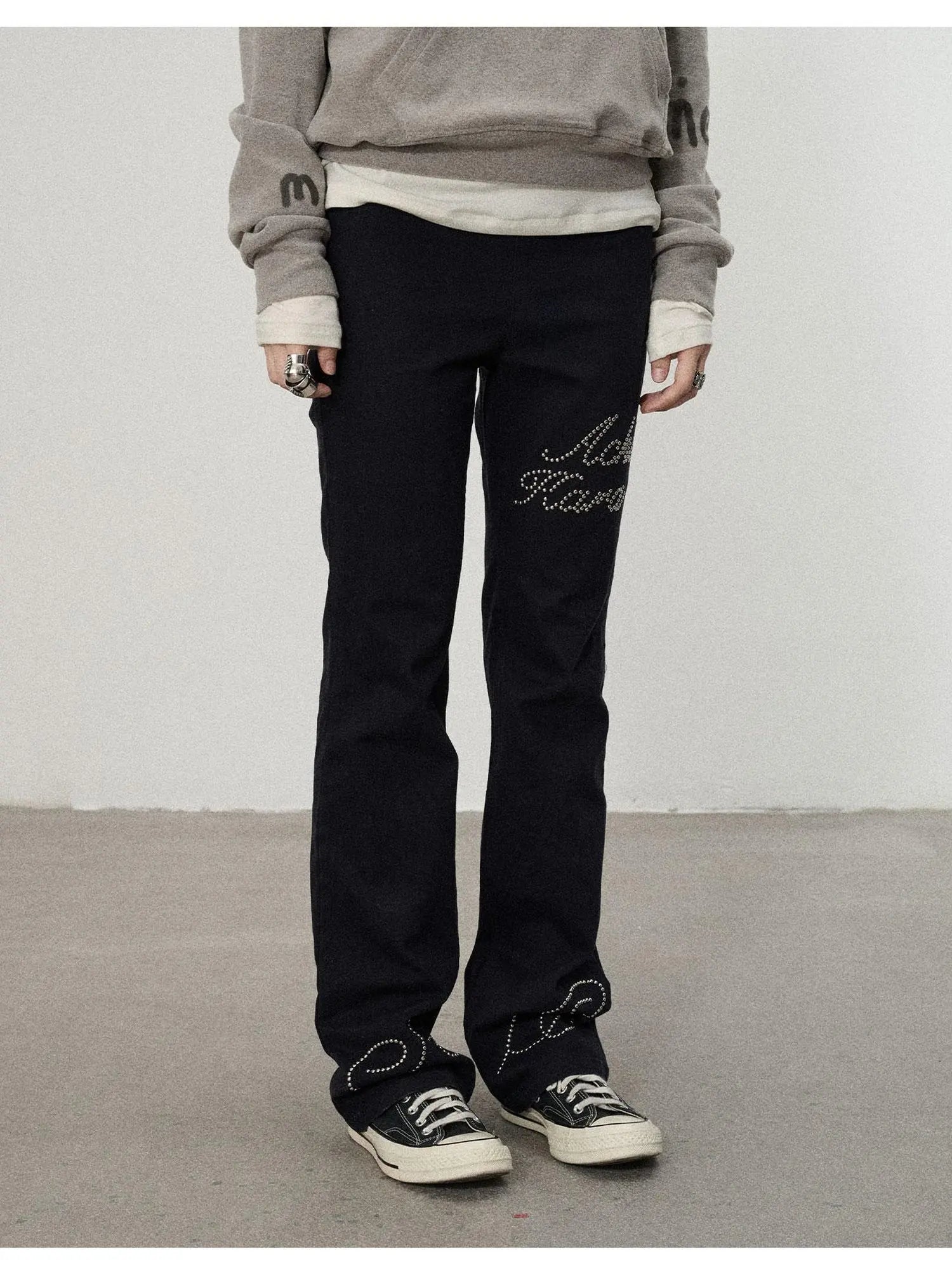 Distressed Denim With Rhinestone Flares