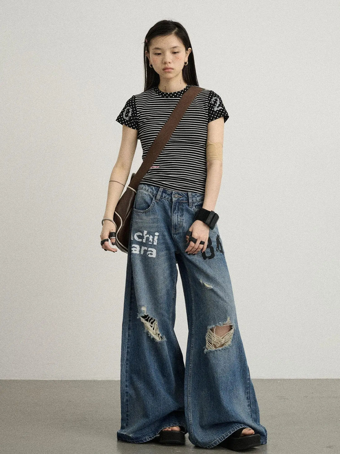 Vintage Washed Wide Leg Jeans With Distressed Details