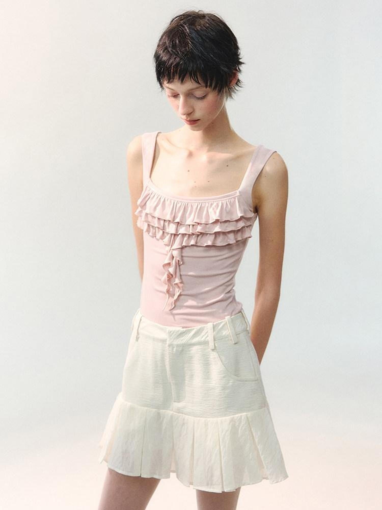 AnnoMundi Mini-jupe blanche plissée à volants et empiècements, taille haute, en polyester viscose pour femmes