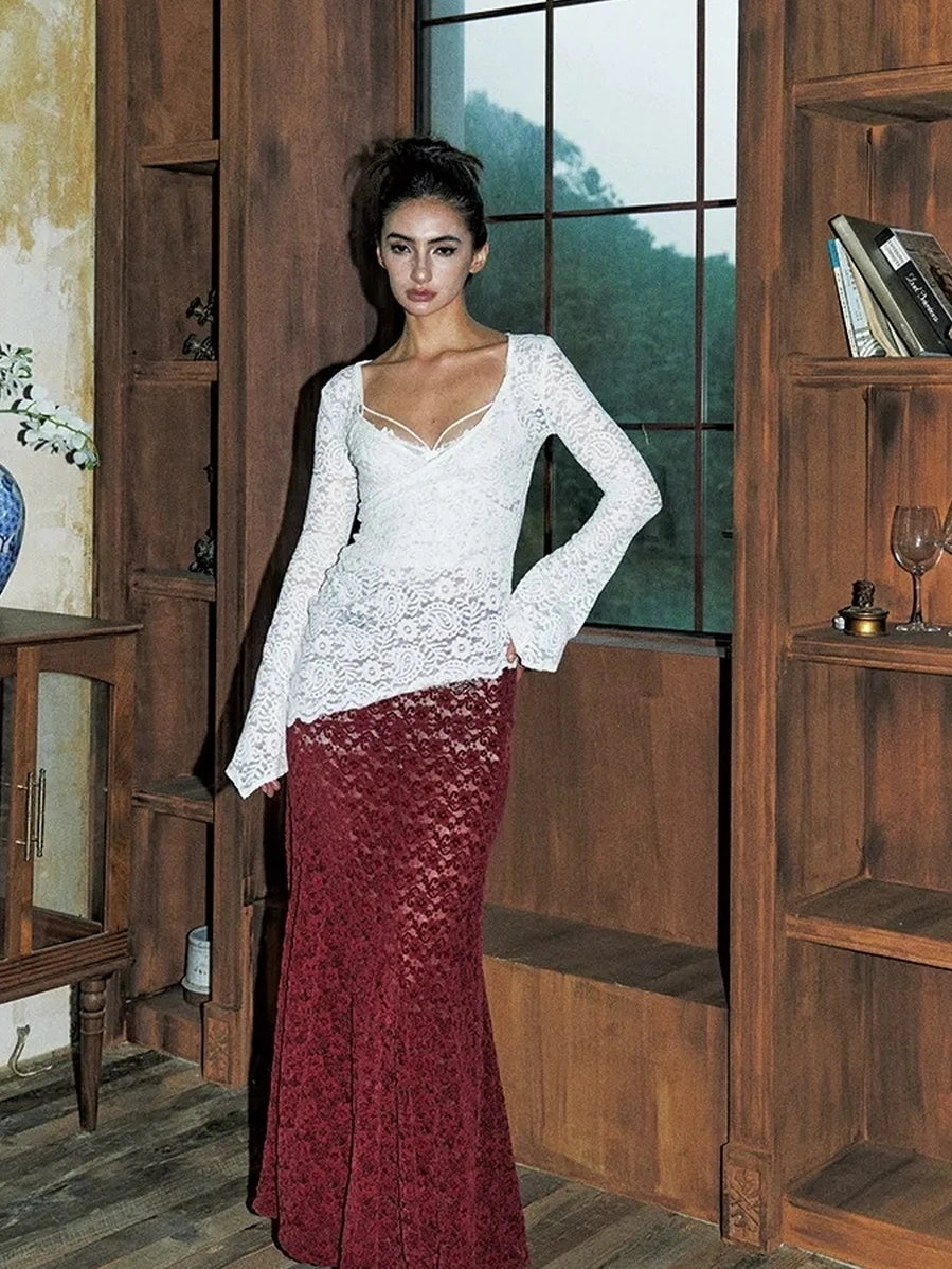 Anti Being General Rebel Lace Asymmetric Top 
V-neck 
Asymmetric Hem 
Lace Up Front 
Long Sleeve 
Cropped Length 
T-shirt Cardigan