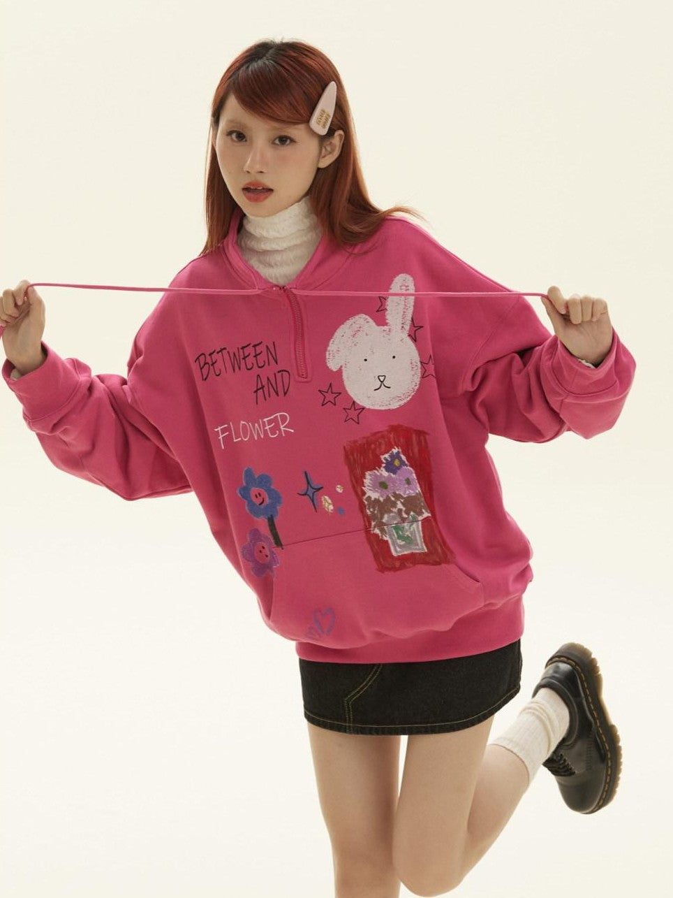 BETWEENAND Graffiti Cartoon Rabbit Print Zip Half High Collar Ribbed Women&