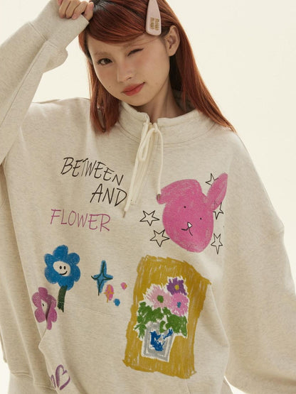 BETWEENAND Graffiti Cartoon Rabbit Print Zip Half High Collar Ribbed Women&