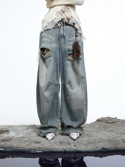 Vintage Wash Distressed Crescent Wide Leg Jeans