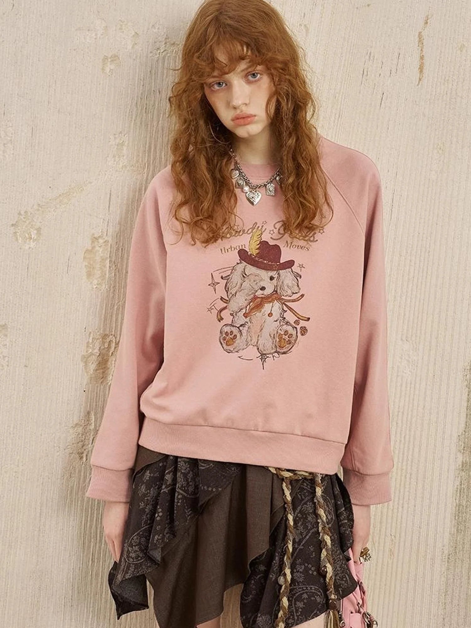 Blindfold Pup Canele Sweatshirt