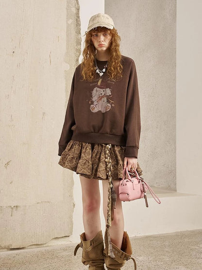 Blindfold Pup Canele Sweatshirt