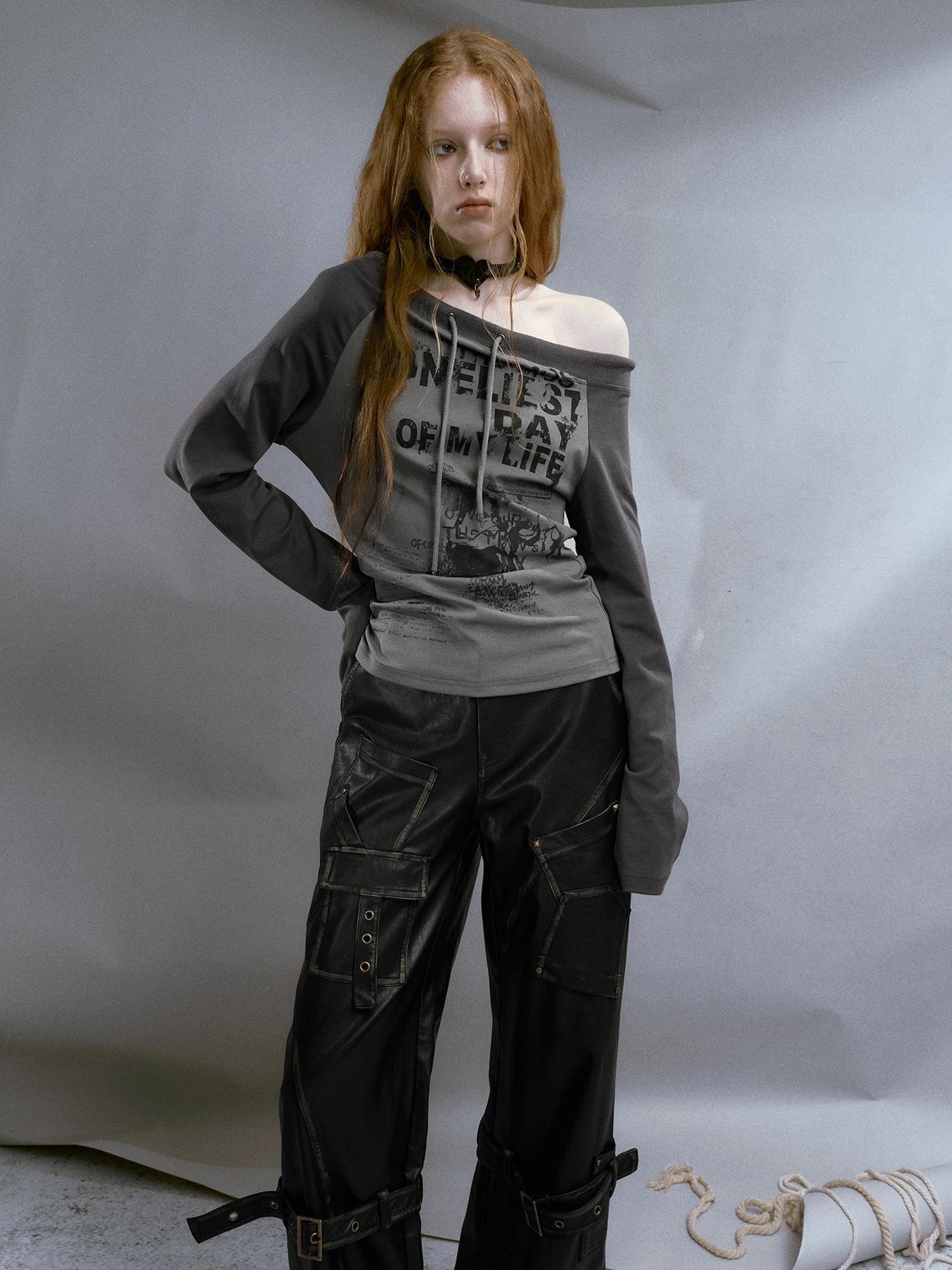 Cest Nous Run From Bad Love Asymmetrical Shoulder Graphic Knit Top