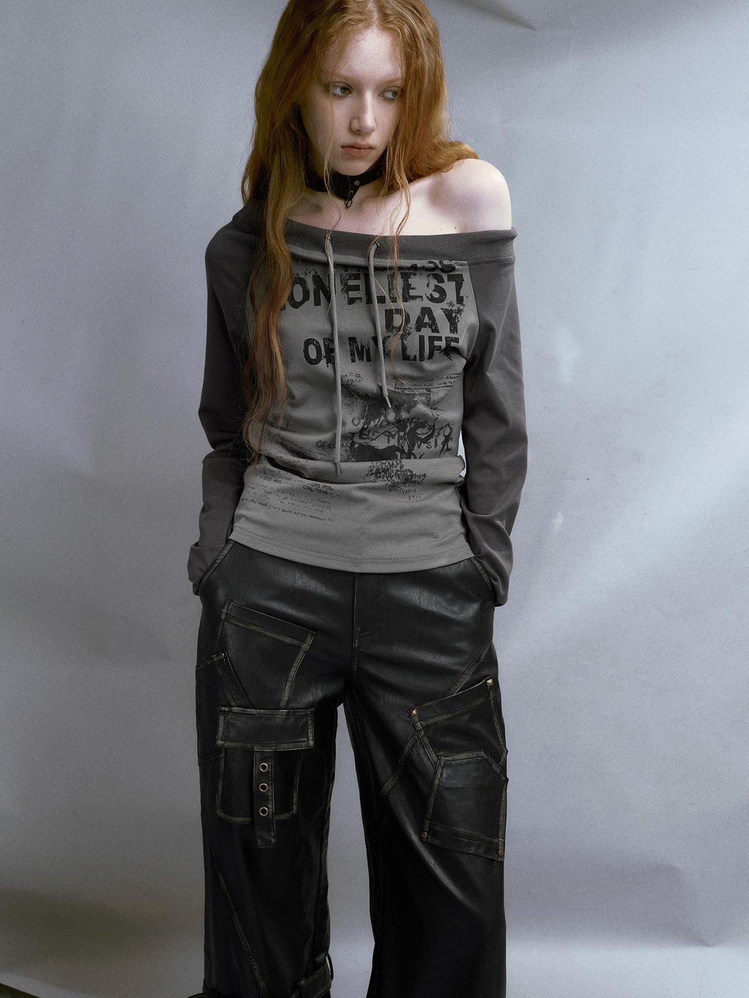 Cest Nous Run From Bad Love Asymmetrical Shoulder Graphic Knit Top