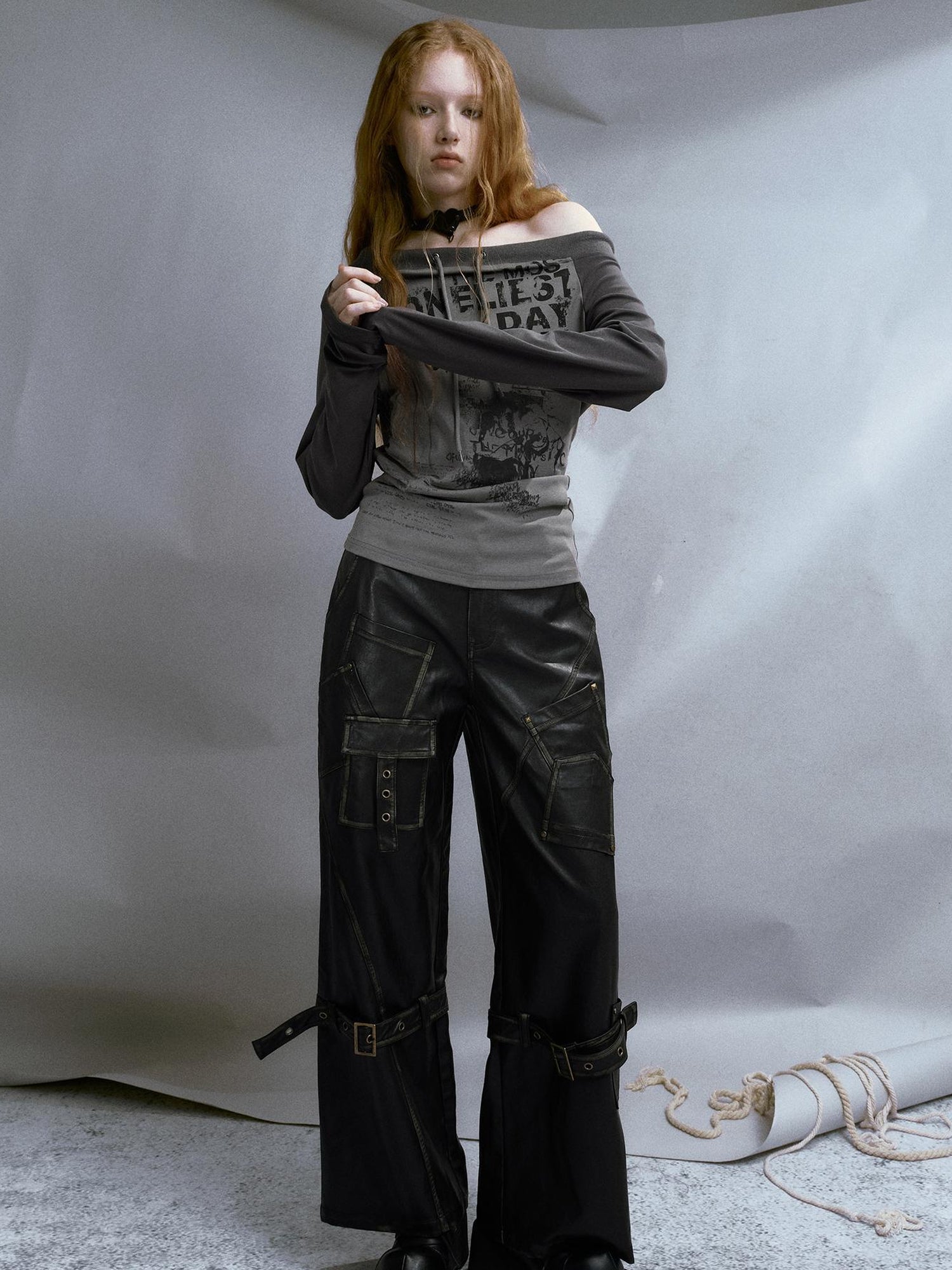 Cest Nous Run From Bad Love Asymmetrical Shoulder Graphic Knit Top