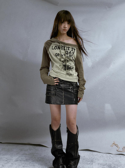 Cest Nous Run From Bad Love Asymmetrical Shoulder Graphic Knit Top