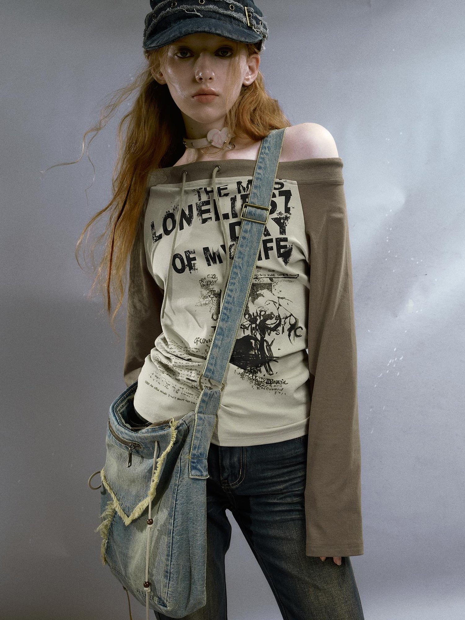 Cest Nous Run From Bad Love Asymmetrical Shoulder Graphic Knit Top