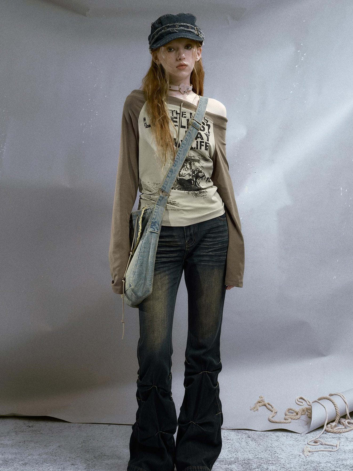 Cest Nous Run From Bad Love Asymmetrical Shoulder Graphic Knit Top