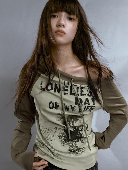 Cest Nous Run From Bad Love Asymmetrical Shoulder Graphic Knit Top