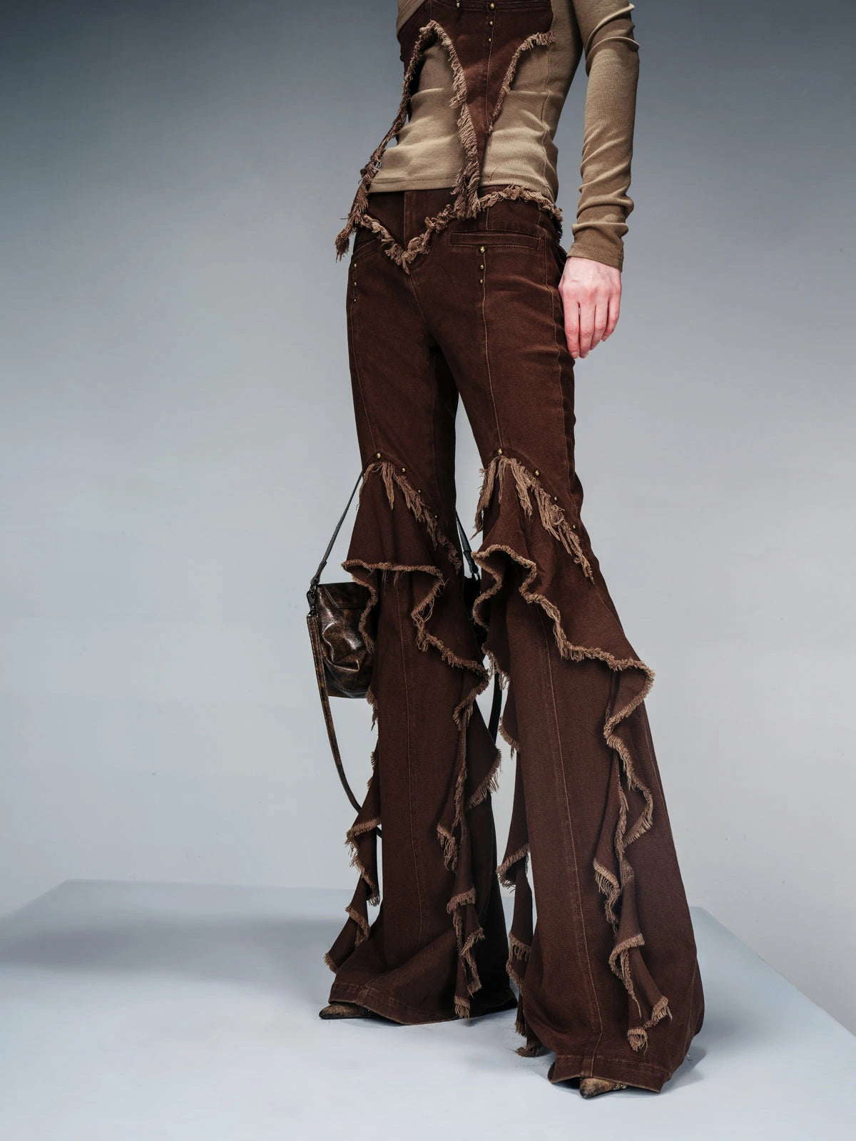 Flared Denim Pants With Asymmetrical Hem