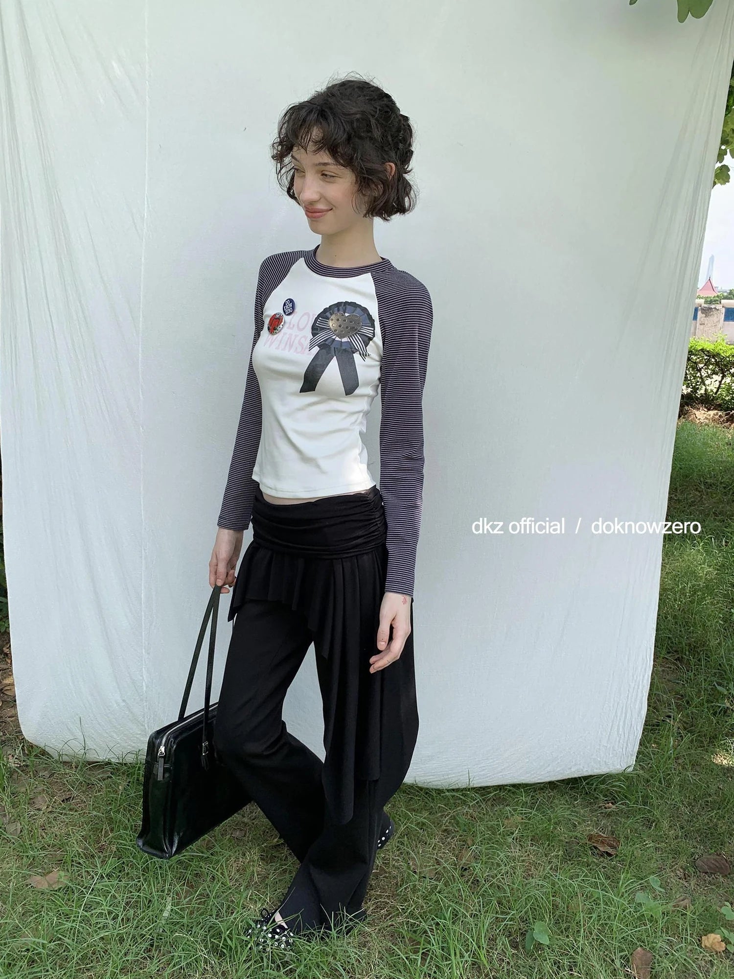 DKZ OFFICIAL Black Layered Waist Flared Ballet Pants
