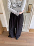 DKZ_OFFICIAL_Elastic_Waist_Dropped_Hem_Wide_Leg_Trousers_MISSTT