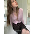 DKZ_OFFICIAL_Fuzzy_Alpaca_Wool_Knit_V-neck_Button_Pocket_Women&