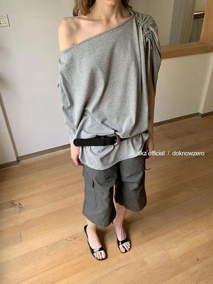 DKZ OFFICIAL Gray Batwing Sleeve T-shirt With Drawstring And Off-Shoulder Design