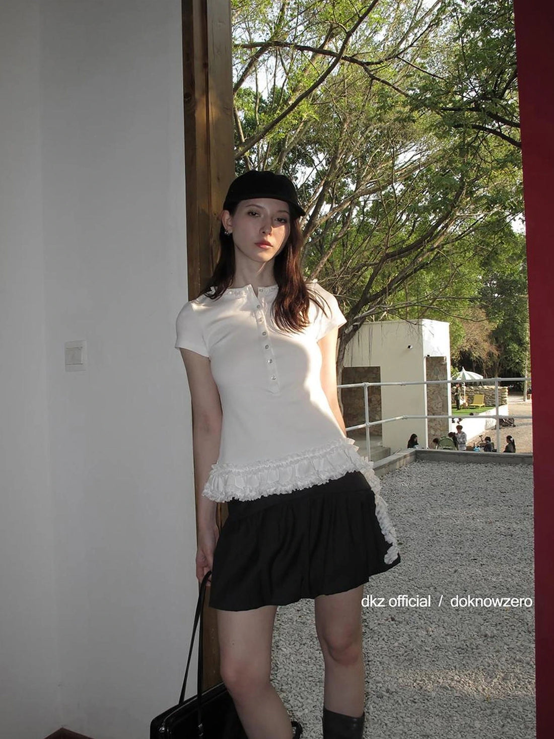 DKZ OFFICIAL Henry Collar Short Sleeve T-shirt With Hem Ruffle Design