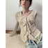 DKZ_OFFICIAL_Irregular_Ruffle_Ribbon_V-neck_Knit_Women&