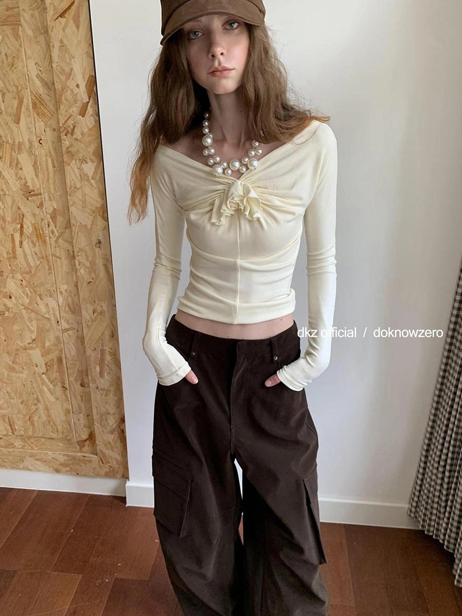 DKZ OFFICIAL One Shoulder Long Sleeve Top with Ruffle Flower Design