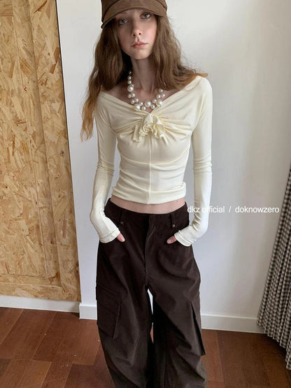 DKZ OFFICIAL One Shoulder Long Sleeve Top with Ruffle Flower Design