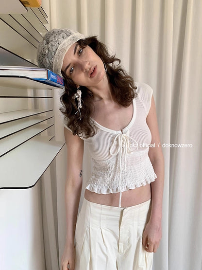 DKZ_OFFICIAL_Pleated_Sleeveless_T-shirt_With_Bow_Tie_And_Scalloped_Hem_MISSTT