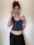DKZ_OFFICIAL_Pleated_Sleeveless_T-shirt_With_Bow_Tie_And_Scalloped_Hem_MISSTT
