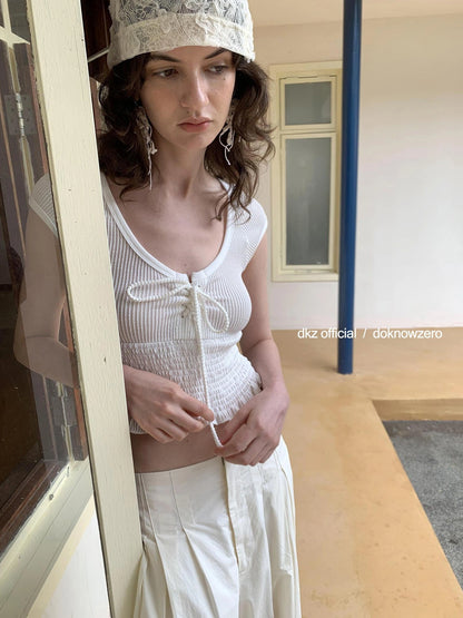 DKZ OFFICIAL Pleated Sleeveless T-shirt With Bow Tie And Scalloped Hem