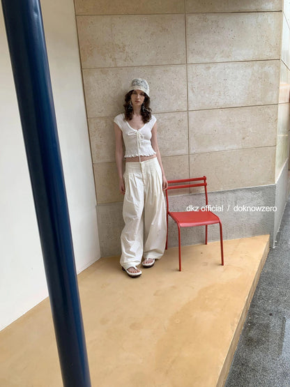 DKZ OFFICIAL Pleated Sleeveless T-shirt With Bow Tie And Scalloped Hem