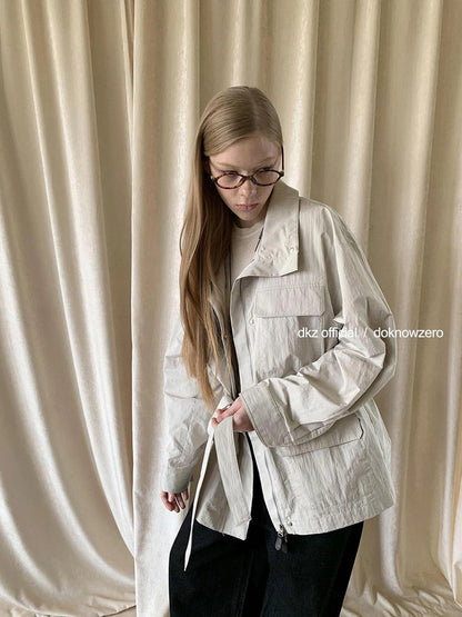 DKZ OFFICIAL Stand Up Collar Drawstring Windbreaker With Multi Pockets