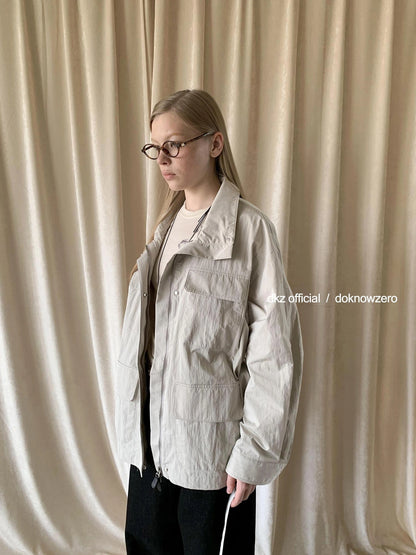DKZ OFFICIAL Stand Up Collar Drawstring Windbreaker With Multi Pockets