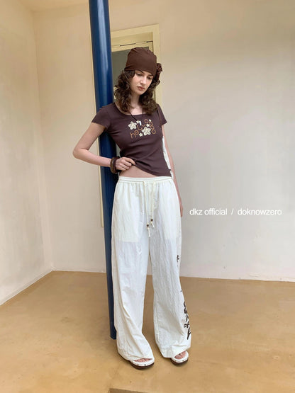DKZ OFFICIAL Summer Vacation Print Drawstring Trousers