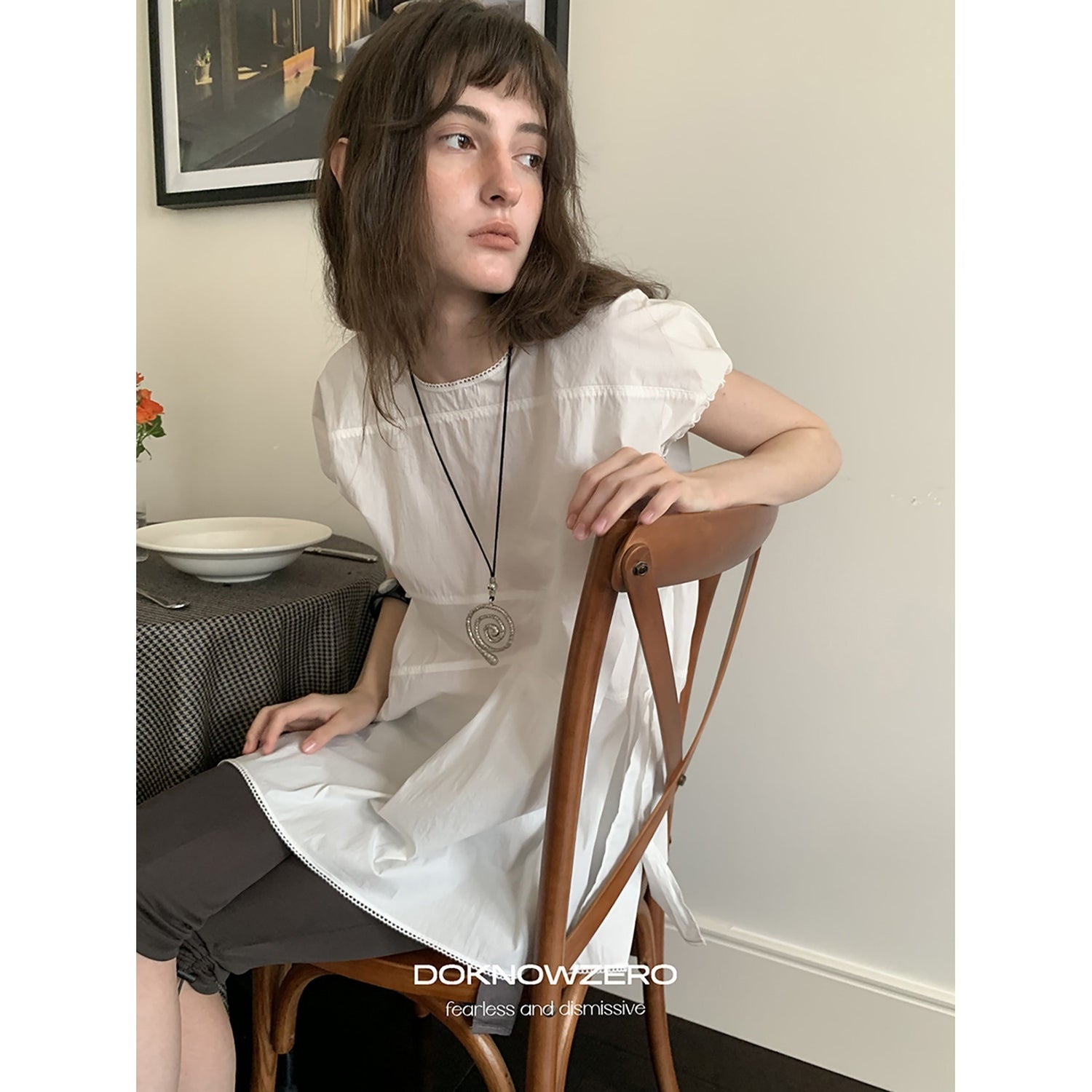 DKZ_OFFICIAL_White_Cap_Sleeve_Round_Neck_Loose_Fit_Women&
