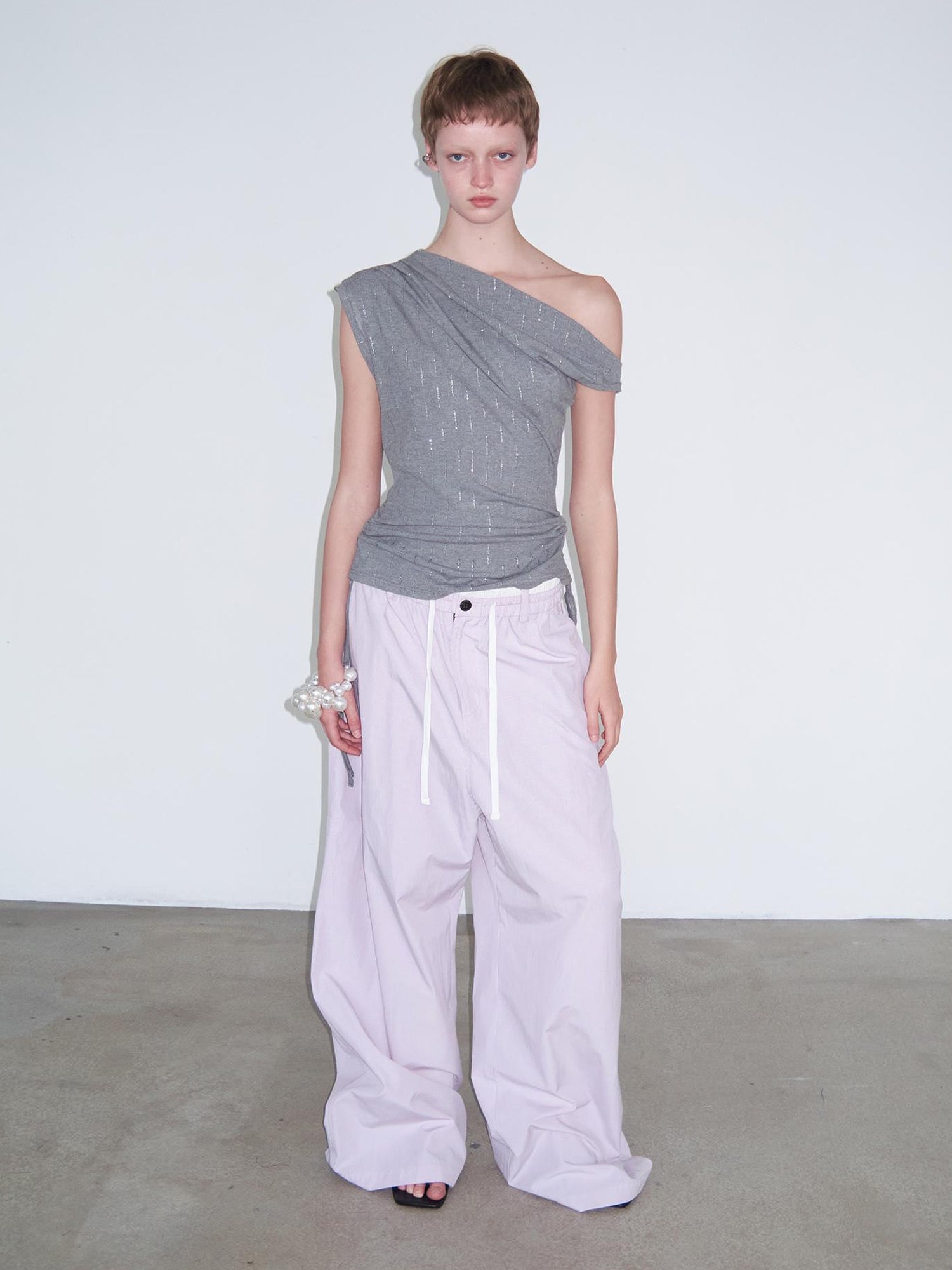 Delivery Asymmetric Shoulder Ruffle Top With Drawstring And Metallic Detail
