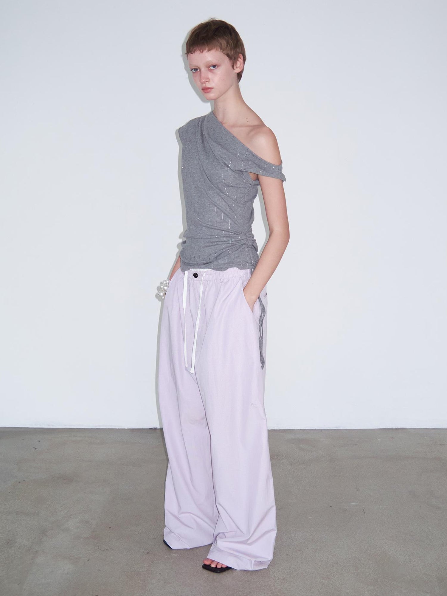 Delivery Asymmetric Shoulder Ruffle Top With Drawstring And Metallic Detail